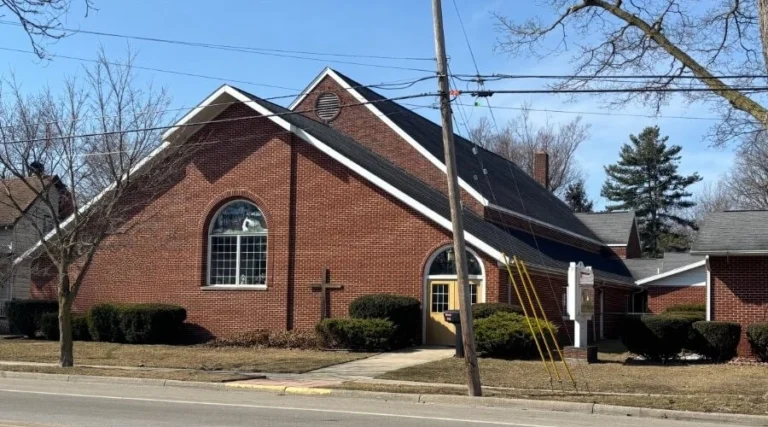Outside photo of church building at 326 S. McKenzie St. Adrian MI 49221